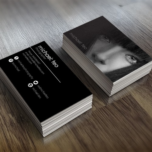 Create a business card for a high end fashion photographer