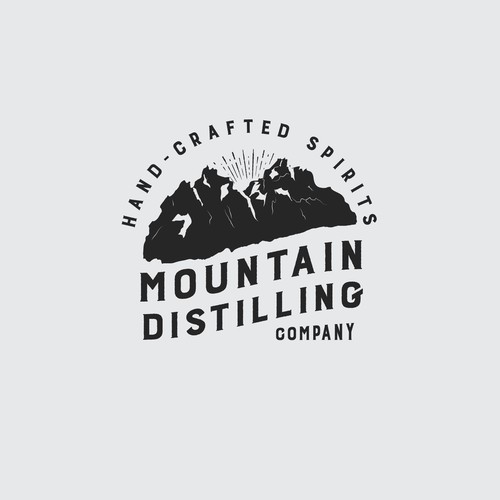 Logo for mountain distilling company