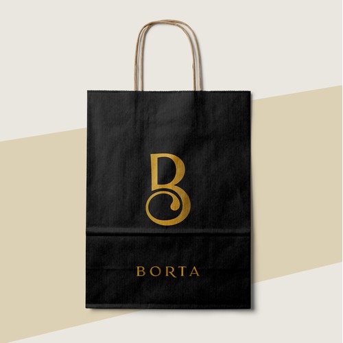 An elegant monogram logo design for a brand that sells shoes, handbags, wallets etc.