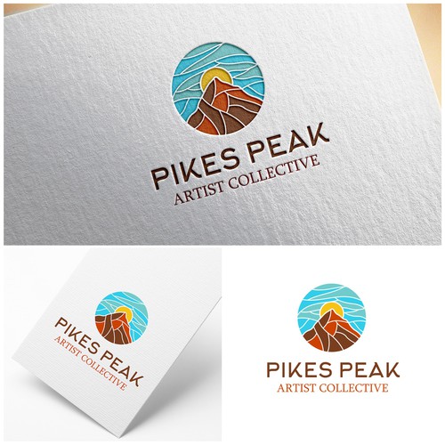 Design a logo for an artist collective studio located at the base of Pikes Peak mountain