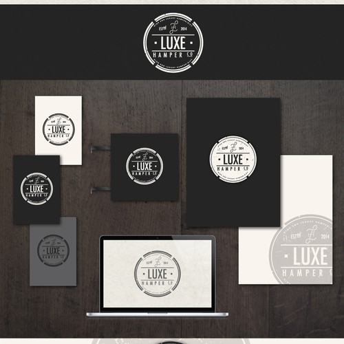 Create a fresh and luxurious stamp style logo for Luxe Hamper Co