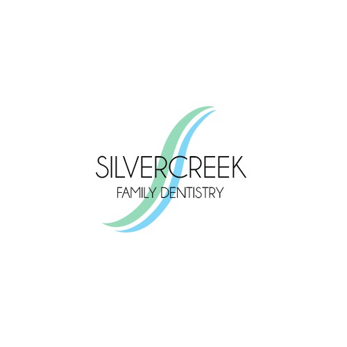 Create a family friendly dental office logo that would represent a Silvercreek.