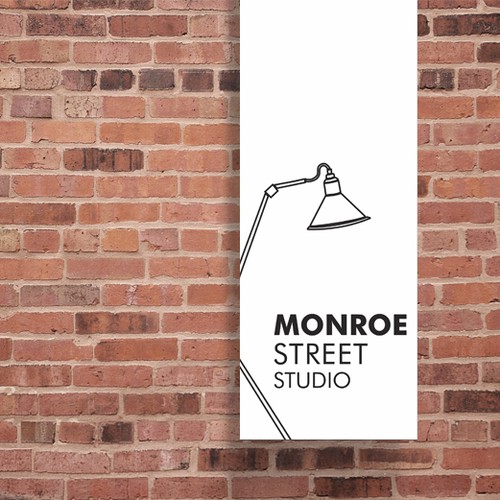 Design the sign for an art and language studio in a historical brick building