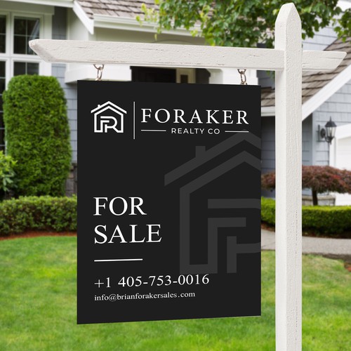 Forsale signage for Foraker Realty Co.