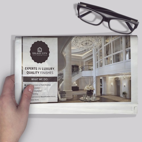 Design a newspaper advertisement for a high end painting compa