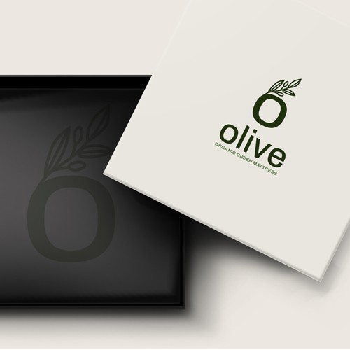 An elegant monogram based logo design for a natural organic mattress brand
