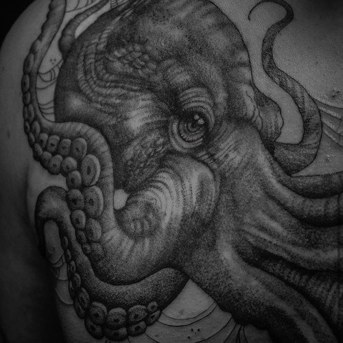 Octopus chest tattoo