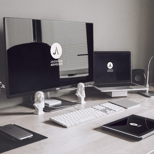 Clean and simple monogram for a newspaper logo redesign