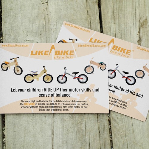 Create a info/photo sales postcard for a kids wooden balance bike company